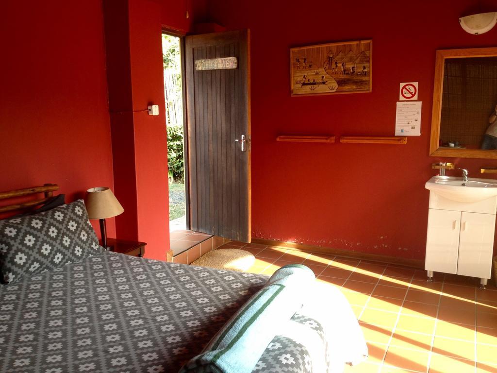 Jungle Monkey Backpackers Port Saint Johnʼs Quarto foto